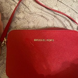 New Michael kors purse used once negotiable price